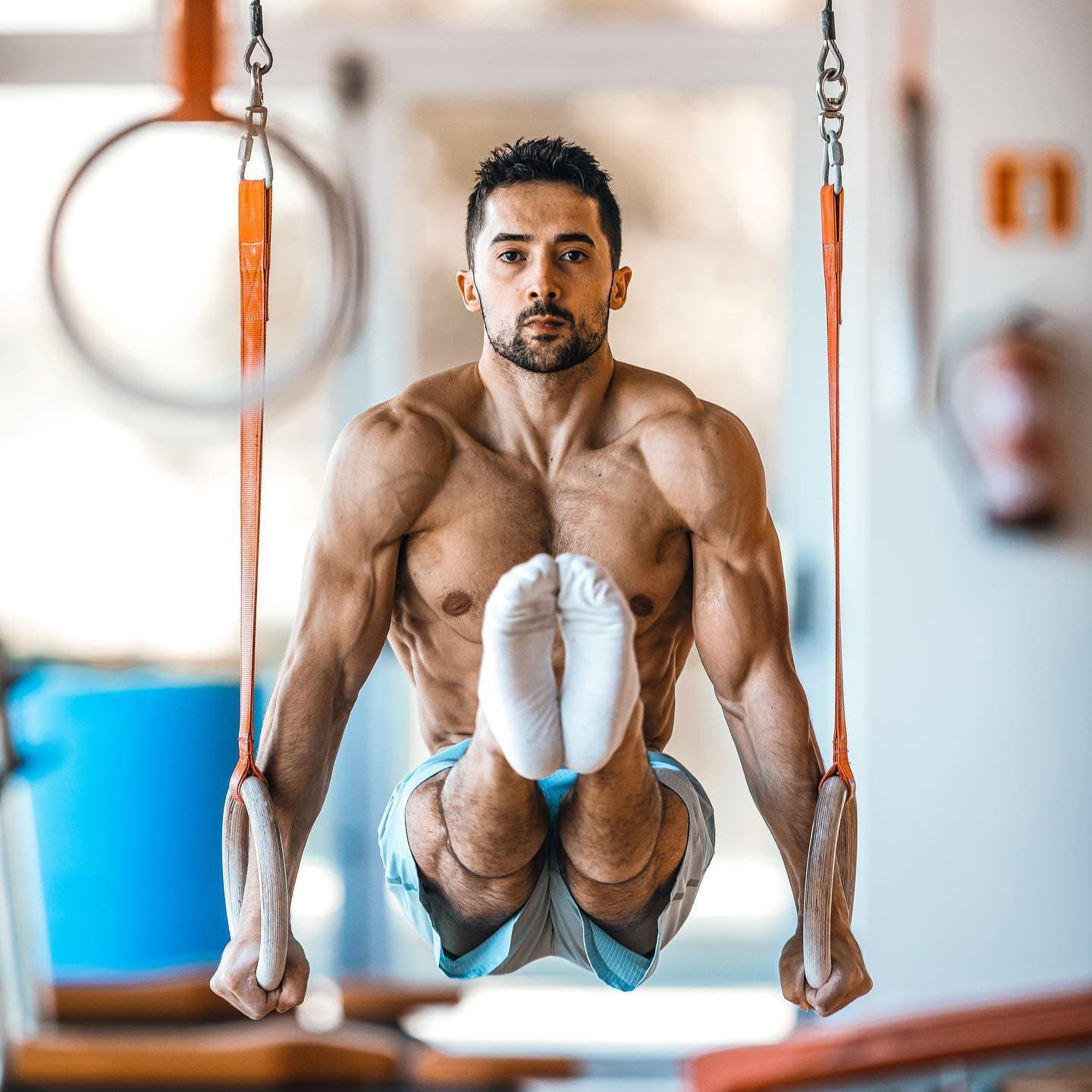 Rubén López performing an L-hold on rings